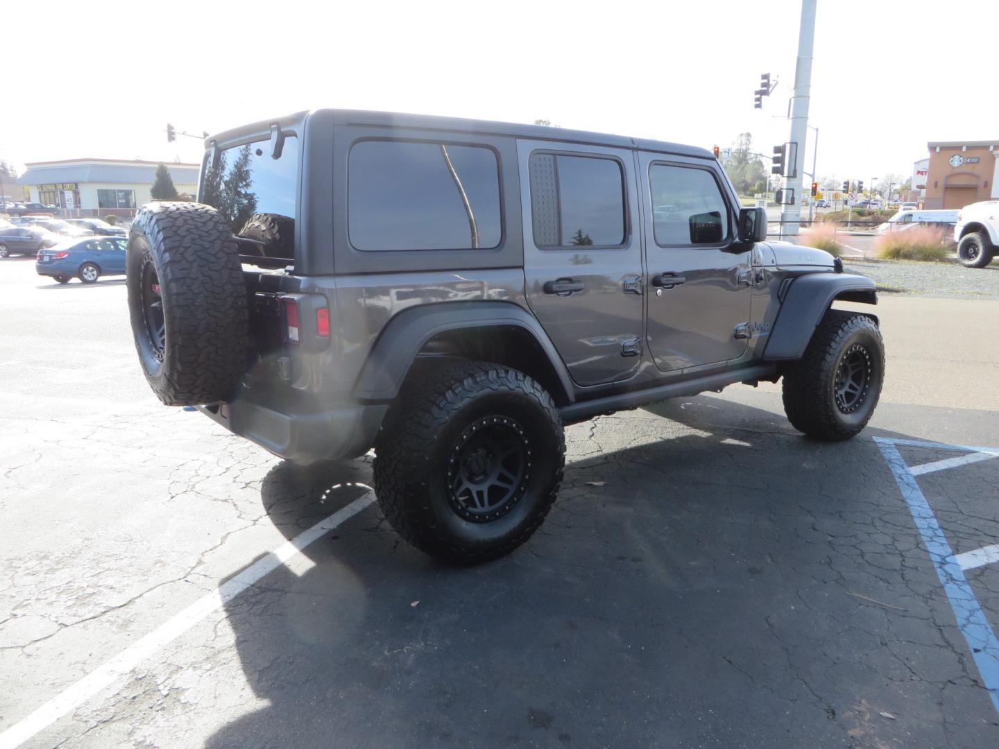 2023 CHARCOAL /black Jeep Wrangler Unlimited Willys 4XE (1C4JJXN68PW) with an 2.0L L4 DOHC 16V HYBRID engine, 8A transmission, located at 2630 Grass Valley Highway, Auburn, CA, 95603, (530) 508-5100, 38.937893, -121.095482 - 3" Zone Offroad lift kit, Fox Adventure series shocks, 17" Method Race wheels, 37" BFG KO2 tires, and a Teraflex spare tire carrier. - Photo#4